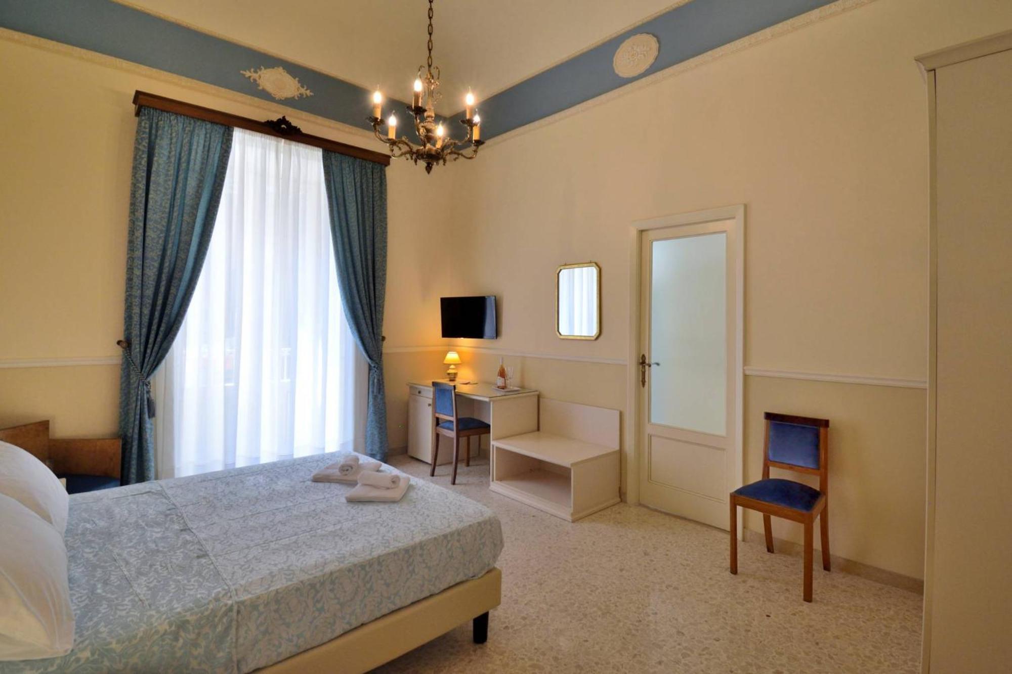 Bellini Inn Deluxe Катанія Номер фото